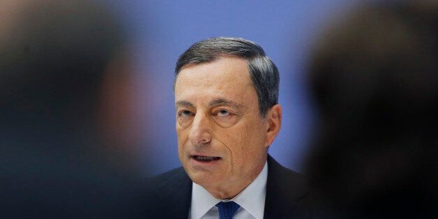 The president of the European Central Bank Mario Draghi speaks during a news conference following a meeting of the governing council in Frankfurt, Germany, Thursday, Dec. 3, 2015. (AP Photo/Michael Probst)