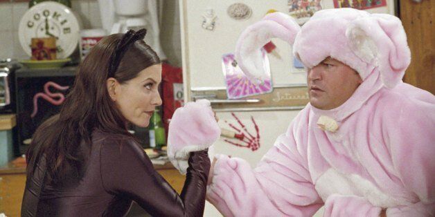 FRIENDS -- 'The One with the Halloween Party' -- Epsiode 6 -- Aired 11/1/2001 -- Pictured: (l-r) Courteney Cox as Monica Geller-Bing as 'Catwoman', Matthew Perry as Chandler Bing as 'Big Pink Bunny'-- Photo by: NBCU Photo Bank
