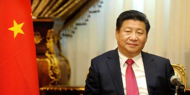 Chinese President Xi Jinping visits the parliament in Cairo, Egypt, Thursday, Jan. 21, 2016. Jinping is on a two-day visit to the country. It is the first time in 12 years that a Chinese president has visited Egypt. (AP Photo/Ahmed Omar)