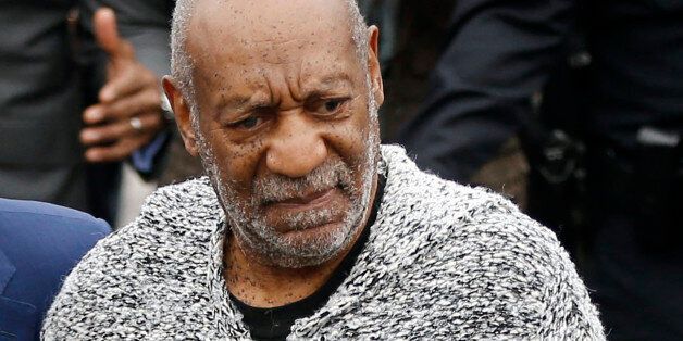 Bill Cosby arrives at court to face a felony charge of aggravated indecent assault Wednesday, Dec. 30, 2015, in Elkins Park, Pa. Cosby was charged Wednesday with drugging and sexually assaulting a woman at his home 12 years ago. (AP Photo/Matt Rourke)