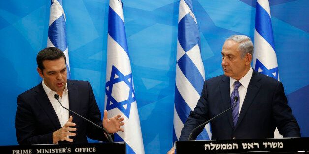 Israel's Prime Minister Benjamin Netanyahu, right, and Greece's Prime Minister Alexis Tsipras, hold joint a press conference, in Jerusalem, Wednesday, Nov. 25, 2015. (Ronen Zvulun/Pool Photo via AP)