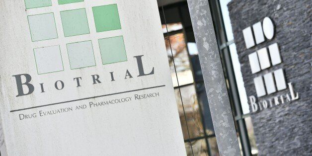 A picture taken on January 16, 2016, in Rennes, western France, shows the logo of the Biotrial laboratory on its building where a clinical trial of an oral medication left one person brain-dead and five hospitalised.The study was a phase one clinical trial, in which healthy volunteers take the medication to 'evaluate the safety of its use, tolerance and pharmacological profile of the molecule', French Health Minister Marisol Touraine added in a statement. / AFP / LOIC VENANCE (Photo credit should read LOIC VENANCE/AFP/Getty Images)