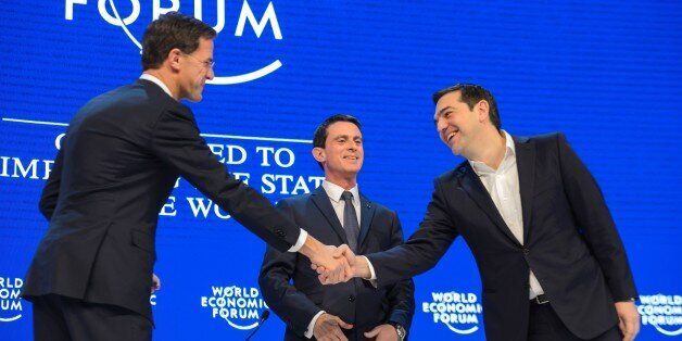 (L-R) Ductch Prime Minister Mark Rutte, French Prime Minister Manuel Valls and Greek Prime Minister Alexis Tsipras are pictured prior to a session at the World Economic Forum (WEF) annual meeting in Davos, on January 21, 2016. Rising risks to the global economy and a string of jihadist attacks around the world overshadowed opening of an annual meeting of the rich and powerful in a snow-blanketed Swiss ski resort. / AFP / FABRICE COFFRINI (Photo credit should read FABRICE COFFRINI/AFP/Get