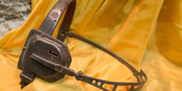 A metal medieval female chastity belt - studio shot
