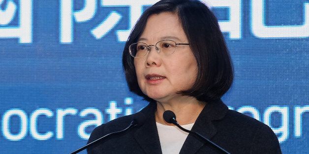 Tsai Ing-wen, Taiwan's president-elect, right, delivers her victory speech during a news conference in Taipei, Taiwan, on Saturday, Jan. 16, 2016. Taiwan opposition leader Ing-wen rode a tide of discontent over everything from China ties to economic growth to become the island's first female president and secure a historic legislative majority for her Democratic Progressive Party. Photographer: Maurice Tsai/Bloomberg via Getty Images