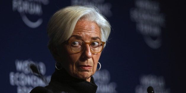 Christine Lagarde, managing director of the International Monetary Fund (IMF), reacts during a panel session at the World Economic Forum (WEF) in Davos, Switzerland, on Wednesday, Jan. 20, 2016. World leaders, influential executives, bankers and policy makers attend the 46th annual meeting of the World Economic Forum in Davos from Jan. 20 - 23. Photographer: Matthew Lloyd/Bloomberg via Getty Images