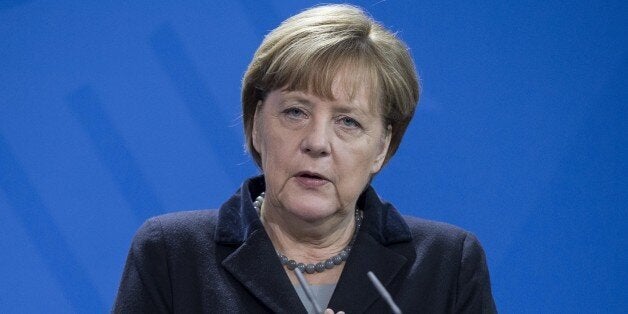 BERLIN, GERMANY - JANUARY 7: Prime Minister of Germany Angela Merkel gestures during a joint press conference after her meeting with her Romanian counterpart Dacian Ciolos (not seen) in Berlin, Germany on January 7, 2016. (Photo by Mehmet Kaman/Anadolu Agency/Getty Images)