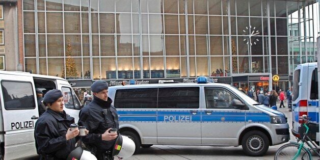 Police officers patrol in front of the main station of Cologne, Germany, on Wednesday, Jan. 6, 2016. More women have come forward alleging they were sexually assaulted and robbed during New Yearâs celebrations in the German city of Cologne, as police faced mounting criticism for their handling of the incident. (AP Photo/Hermann J. Knippertz)