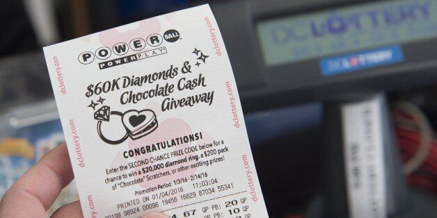 A Powerball lottery ticket is seen at a liquor store in Washington, DC, January 4, 2016. Lottery officials predict the January 6 jackpot will reach $400 million, one of the largest in the game's history. AFP PHOTO / SAUL LOEB / AFP / SAUL LOEB (Photo credit should read SAUL LOEB/AFP/Getty Images)