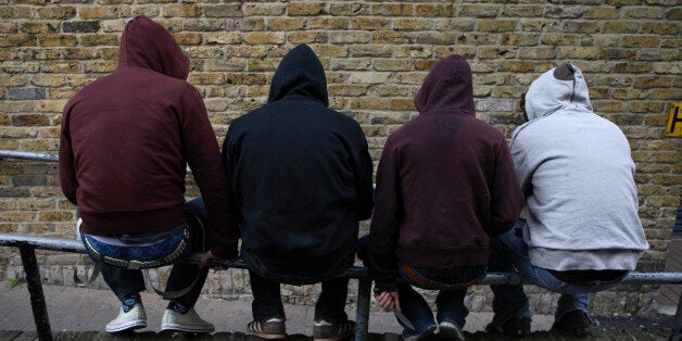 Hoodies sat on railings