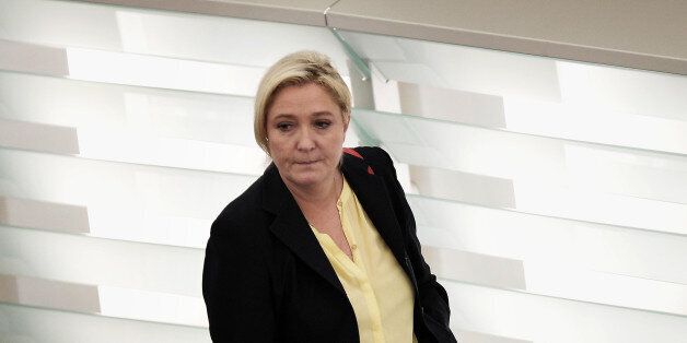 French Front National (FN) far-right party's President and European MP Marine Le Pen arrives to take part in a plenary session at the European Parliament in Strasbourg, eastern France, on December 15, 2015. / AFP / FREDERICK FLORIN (Photo credit should read FREDERICK FLORIN/AFP/Getty Images)