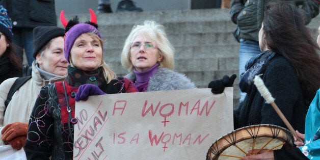 Participants of a women's flash mob demonstrate against racism and sexism in Cologne, Germany, Saturday, Jan. 9, 2016. Womenâs rights activists, far-right demonstrators and left-wing counter-protesters all took to the streets of Cologne on Saturday in the aftermath of a string of New Yearâs Eve sexual assaults and robberies in Cologne blamed largely on foreigners. (AP Photo/Juergen Schwarz)