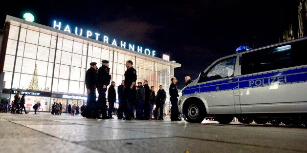 COLOGNE, GERMANY - JANUARY 09: Police stand guard in front of Hauptbahnhof main railway station after an Pegida, Hogesa (Hooligans against Salafists) and other right-wing populist groups gather to protest against the New Year's Eve sex attacks on January 9, 2016 in Cologne, Germany. Over 100 women have filed charges of sexual molestation, robbery and in two cases, rape, stemming from aggressive groping and other behavior by gangs of drunken men described as Arab or North African at Hauptbahnhof on New Year's Eve. Police have recently stated that at least some of the men identified so far are refugees, which is feeding the propaganda of right-wing groups opposed to Germany's open-door refugee policy. Germany took in approximately 1.1 million migrants and refugees in 2015. (Photo by Sascha Schuermann/Getty Images)