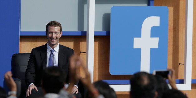 Facebook CEO Mark Zuckerberg speaks at Facebook in Menlo Park, Calif., Sunday, Sept. 27, 2015. A rare visit by Indian Prime Minister Narendra Modi this weekend has captivated his extensive fan club in the area and commanded the attention of major U.S. technology companies eager to extend their reach into a promising overseas market. (AP Photo/Jeff Chiu)