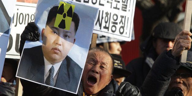 SEOUL, SOUTH KOREA - JANUARY 07: South Korean protesters particpate in an anti-North Korea rally on January 7, 2016 in Seoul, South Korea. North Korea announced yesterday that they had successfully carried out its first test of a hydrogen bomb. (Photo by Chung Sung-Jun/Getty Images)