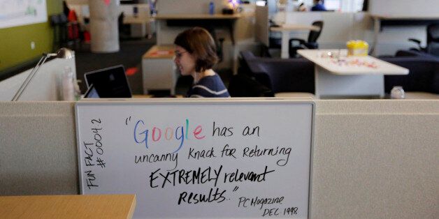 An employee works in the new Google Chicago Headquarters Thursday, Dec. 3, 2015, in Chicago. The new offices occupy about 200,000 square feet and house a staff of around 650 full time employees. (AP Photo/M. Spencer Green)