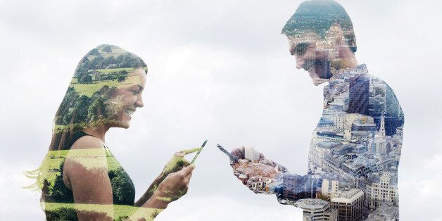 Double exposure of a man and woman using smart phones in different locations. One in the countryside and one in the city.