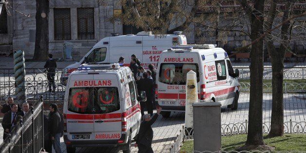 ISTANBUL, TURKEY - JANUARY 12: Ambulances and police were despatched to the blast site after an explosion in the central Istanbul Sultanahmet district on January 12, 2016 in Istanbul, Turkey. At least 10 people have been killed and 15 wounded in a suicide bombing near tourists in the central Istanbul historic Sultanahmet district, which is home to world-famous monuments including the Blue Mosque and the Hagia Sophia. Turkish President Erdogan has stated that the suicide bomber was of Syrian origin. (Photo by Can Erok/Getty Images)