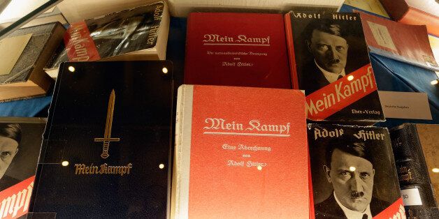 MUNICH, GERMANY - JANUARY 08: Historic copies of Adolf Hitler's 'Mein Kampf' are displayed during the book launch of a new critical edition at the Institut fuer Zeitgeschichte (Institute for Contemporary History) on January 8, 2016 in Munich, Germany. The new edition, which augments Hitler's original text with critical analysis, is the first new publication of the book in Germany since World War II. The state of Bavaria held the copyright to the book and prohibited publication, though the copyr
