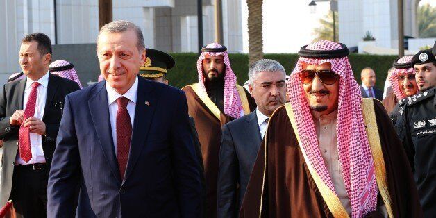 RIYADH, SAUDI ARABIA - DECEMBER 29: Turkish President Recep Tayyip Erdogan (left) and Saudi King Salman bin Abdulaziz Al Saud (right) attend an official welcome ceremony prior to their meeting at Al Yamama Palace in Riyadh, Saudi Arabia, on December 29, 2015. (Photo by Kayhan Ozer/Anadolu Agency/Getty Images)