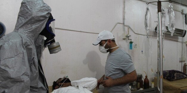 ALEPPO, SYRIA - SEPTEMBER 01: Wounded people receive treatment after Daesh terrorists' mustard gas attack in anti-regimist forces controlled Mari District of Aleppo, Syria on September 01, 2015. (Photo by Mamun Ebu Omer/Anadolu Agency/Getty Images)