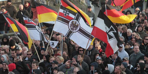 Right-wing demonstrators march in Cologne, Germany Saturday Jan. 9, 2016. Womenâs rights activists, far-right demonstrators and leftwing counter-protesters all took to the streets of Cologne on Saturday in the aftermath of a string of New Yearâs Eve sexual assaults and robberies in Cologne blamed largely on foreigners. (AP Photo/Juergen Schwarz)