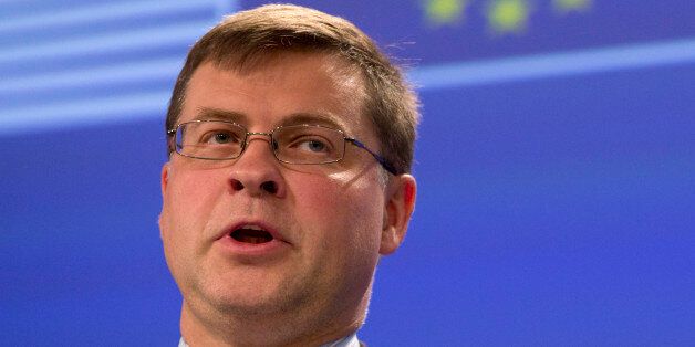 European Commission Vice-President Valdis Dombrovskis speaks during a media conference at EU headquarters in Brussels on Wednesday, July 1, 2015. The eurozone's finance ministers are set to weigh a last-minute Greek proposal for a new aid program, submitted Tuesday afternoon, in a conference call which will take place on Wednesday. (AP Photo/Virginia Mayo)