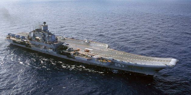 ** FILE ** In this 2004 file photo the Admiral Kuznetsov carrier seen in the Barents Sea, Russia. Russia's sole aircraft carrier and several accompanying ships set off Friday Dec. 5, 2008, for combat training in the Atlantic and the Mediterranean just as another squadron was plying the Caribbean in a show of the Kremlin's global reach. (AP Photo)