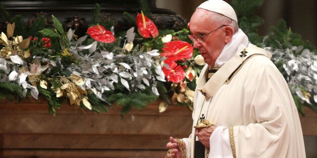 VATICAN CITY, VATICAN - DECEMBER 24: Pope Francis attends the Christmas Night Mass at St. Peter's Basilica on December 24, 2015 in Vatican City, Vatican. Christians around the world will celebrate the birth of Jesus with the Vigil of Christmas Eve Mass tonight. (Photo by Franco Origlia/Getty Images)