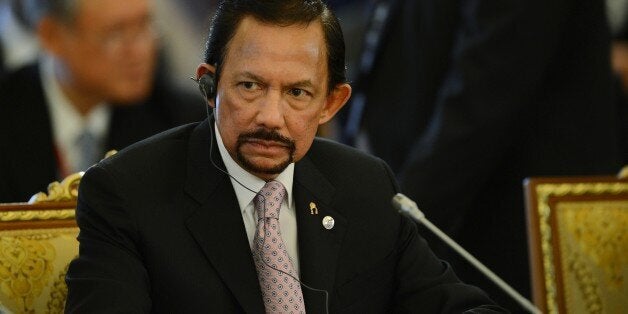 ST. PETERSBURG, RUSSIA - SEPTEMBER 05: In this handout image provided by Host Photo Agency, Sultan of Brunei Hassanal Bolkiah, representing the Association of Southeast Asian Nations (ASEAN), attends the first working meeting of the G20 summit on September 5, 2013 in St. Petersburg, Russia. The G20 summit is expected to be dominated by the issue of military action in Syria while issues surrounding the global economy, including tax avoidance by multinationals, will also be discussed during the two-day summit. (Photo by Vladimir Astapkovich/Host Photo Agency via Getty Images)