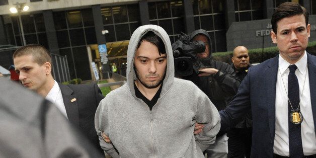 Martin Shkreli, chief executive officer of Turing Pharmaceuticals LLC, exits federal court in New York, U.S., on Thursday, Dec. 17, 2015. Shkreli was arrested on alleged securities fraud related to Retrophin Inc., a biotech firm he founded in 2011. Photographer: Louis Lanzano/Bloomberg via Getty Images