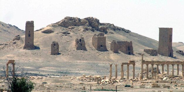 FILE - This file photo released on Sunday, May 17, 2015, by the Syrian official news agency SANA, shows the general view of the ancient Roman city of Palmyra, northeast of Damascus, Syria. Islamic State militants have blown up one of the most important temples in the ancient Syrian city of Palmyra, accelerating their relentless campaign of destruction against the historical treasures that have fallen under their control, activists and monitors said on Sunday, Aug. 30, 2015. (SANA via AP, File)