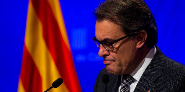 Acting regional President Artur Mas pauses during a press conference at the Generalitat Palace in Barcelona, Spain, Tuesday, Nov. 24, 2015. The acting president for Spainâs powerful northeastern region of Catalonia says he will press ahead with efforts to form a pro-independence government despite having failed to garner sufficient support in two parliament votes so far. (AP Photo/Emilio Morenatti)