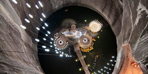 General view of a boat quay on the lake at the bottom of Turda salt mine, in Transylvania. One of the most important salt mines in Transylvania, Salina Turda has been known since ancient times , especially during Roman period