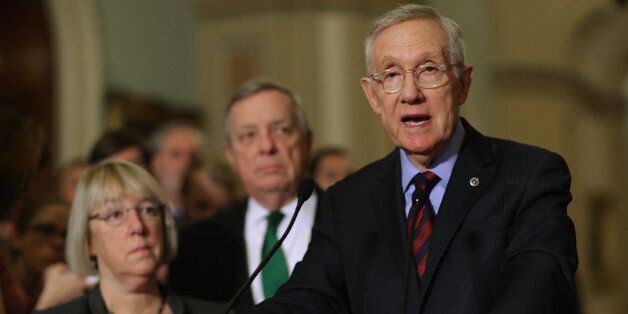 WASHINGTON, DC - DECEMBER 08: Senate Minority Leader Harry Reid (D-NV) (R) talks to reporters with Sen. Patty Murray (D-WA) (L) and Sen. Richard Durbin (D-IL) following the weekly Senate Democratic policy luncheon in the U.S. Capitol December 8, 2015 in Washington, DC. The government is slated to run out of spending authority on December 11 and Republican and Democratic leaders are at an impasse over an omnibus spending bill. (Photo by Chip Somodevilla/Getty Images)