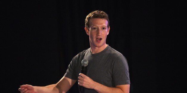 Facebook chief executive and founder Mark Zuckerberg speaks during a 'town-hall' meeting at the Indian Institute of Technology (IIT) in New Delhi on October 28, 2015. Speaking to about 900 students at New Delhi's Indian Institute of Technology, Zuckerberg said broadening Internet access was vital to economic development in a country where a billion people are still not online. AFP PHOTO / Money SHARMA (Photo credit should read MONEY SHARMA/AFP/Getty Images)