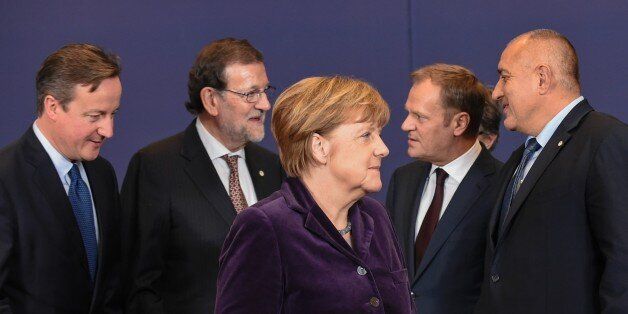 (From L) British Prime minister David Cameron, Spanish Prime Minister Mariano Rajoy, German Chancellor Angela Merkel, European Council President Donald Tusk and Bulgarian Prime Minister Boyko Borisov talk after a family photo during the final European Union (EU) summit of the year at the European Council in Brussels on December 17, 2015.EU leaders will discuss British Prime Minister David Cameron's controversial reform demands as well as plans for a new European border force to deal with the mig