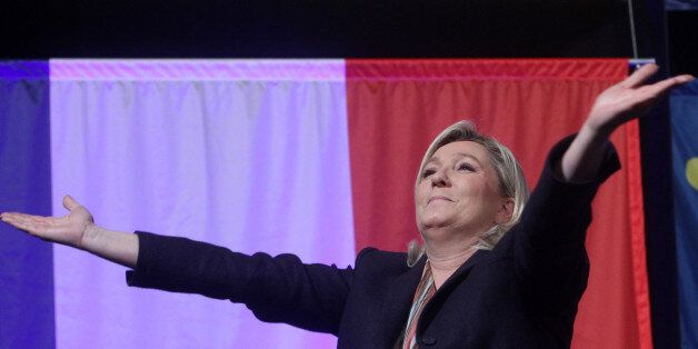 French far-right party leader Marine Le Pen gestures before a meeting in Lille, northern France, Monday, Nov. 30, 2015. France is voting in regional elections Sunday for the first round in which the far right National Front is hoping to increase its political power. The second round of the regional elections will take place on Dec. 13, 2015. (AP Photo/Michel Spingler)
