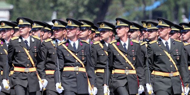 Students of Turkish War Academy parade during Victory Day in Ankara, Turkey Thursday, Aug. 30, 2007. Turkey's new President Abdullah Gul, as commander-in-chief, presided over a ceremony marking an 85-year-old victory over Greeks which was considered crucial in Turkish Independence War which led to foundation of modern Turkish republic. Gul greeted troops at a ceremony Thursday celebrating the military that opposed his candidacy earlier this year.(AP Photo/Burhan Ozbilici)