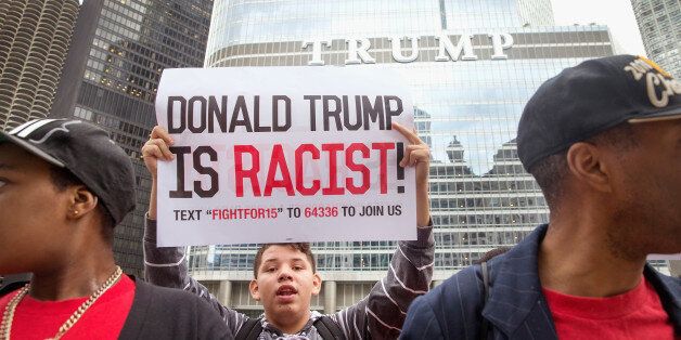 CHICAGO, IL - OCTOBER 12: Demonstrators march to Trump tower during a protest on October 12, 2015 in Chicago, Illinois. About 250 demonstrators marched through downtown before holding a rally calling for immigration reform and fair wages in front of Trump Tower. Trump has been an outspoken proponent of a plan to deport undocumented immigrants. (Photo by Scott Olson/Getty Images)