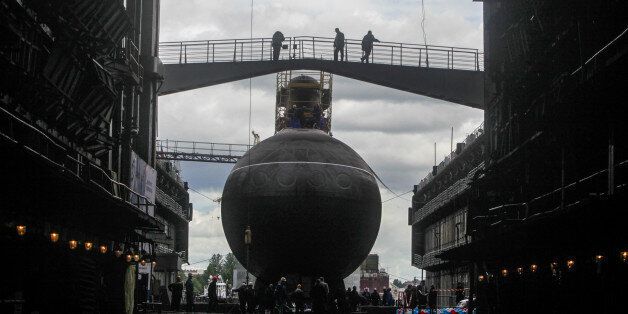 SAINT PETERSBURG, RUSSIA - JUNE 26: The ceremony of descent to water of the diesel electric submarine named 'Rostov-on-Don' at the 'Admiralty Shipyards' enterprise on June 26, 2014 in Saint Petersburg, Russia. (Photo by Sergey Garbovki/Kommersant Photo via Getty Images)
