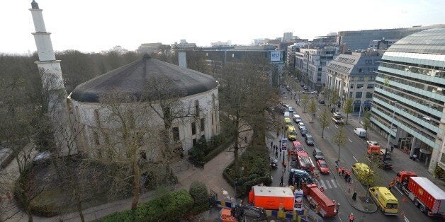 A picture taken on November 26, 2015 shows ambulances, police and fire fighter vehicles outside the mosque after a suspect letter with powder was found at the Great Mosque in Brussels on November 26, 2015. AFP PHOTO / BELGA / ERIC LALMAND ***BELGIUM OUT*** / AFP / BELGA / ERIC LALMAND (Photo credit should read ERIC LALMAND/AFP/Getty Images)