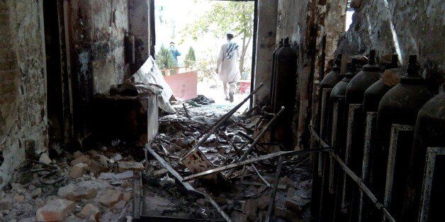 The damaged interior of the hospital in which the Medecins Sans Frontieres (MSF) medical charity operated is seen on October 13, 2015 following an air strike in the northern city of Kunduz. Thirty-three people are still missing days after a US air strike on an Afghan hospital, the medical charity has warned, sparking fears the death toll could rise significantly. AFP PHOTO (Photo credit should read STR/AFP/Getty Images)