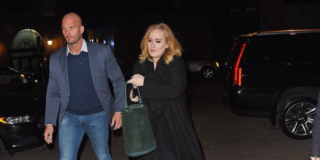 NEW YORK - NOVEMBER 26: Adele pick up a male friend at Morimoto restaurant and head to Nobu together for dinner on November 26, 2015 in New York, New York. (Photo by Josiah Kamau/BuzzFoto via Getty Images)