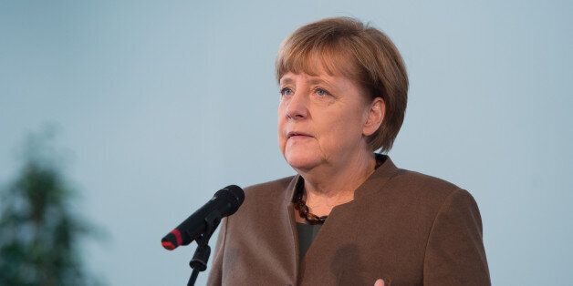 German chancellor Angela Merkel delivers a statement at the chancellery in Berlin Wednesday Nov. 18, 2015. German Chancellor Angela Merkel says security agencies took the right decision to cancel the football friendly between Germany and the Netherlands on Tuesday. The match was called off some 90 minutes before the kickoff after German authorities received mounting information about a possible attack on the stadium following Friday's attacks in Paris. . (Soeren Stache/Pool Photo via AP)