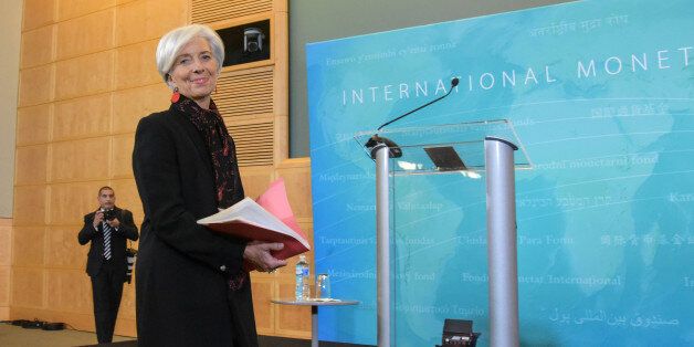 WASHINGTON D.C., Nov. 30, 2015 -- Christine Lagarde, managing director of the IMF, arrives to address a press conference in the headquarters of the International Monetary Fund in Washington D.C., the United States, Nov. 30, 2015. The International Monetary Fund announced on Monday that China's currency renminbi is eligible for joining the Special Drawing Rights basket as an international reserve currency. (Xinhua/Bao Dandan via Getty Images)