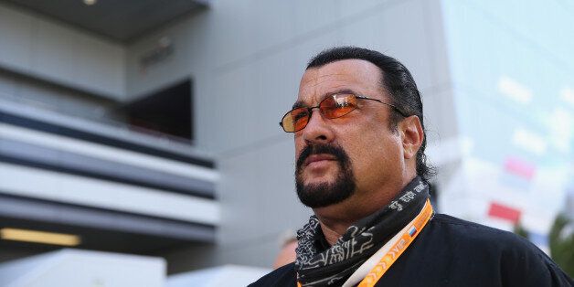 SOCHI, RUSSIA - OCTOBER 11: Actor Steven Seagal attends qualifying ahead of the Russian Formula One Grand Prix at Sochi Autodrom on October 11, 2014 in Sochi, Russia. (Photo by Clive Mason/Getty Images)