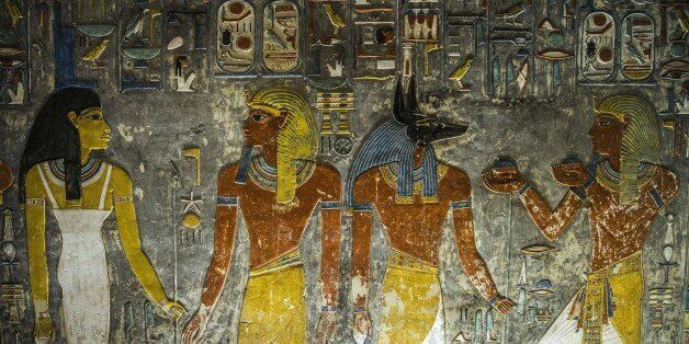 A picture taken on September 29, 2015 shows a relief on the wall inside Horemheb tomb at the Valley of the Kings, close to Luxor, 500 kms south of Cairo, during a media visit. Standing before the majestic gold, ochre and white frescos of Tutankhamun's tomb, British archaeologist Nicholas Reeves passionately defended his daring theory that Nefertiti is buried in a secret chamber. AFP PHOTO / KHALED DESOUKI (Photo credit should read KHALED DESOUKI/AFP/Getty Images)