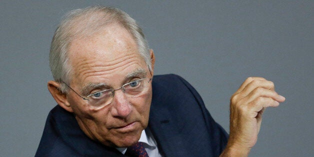 German Finance Minister Wolfgang Schaeuble addresses the German parliament prior to a vote on another bailout package for Greece, in the German Bundestag in Berlin, Wednesday, Aug. 19, 2015. (AP Photo/Markus Schreiber).