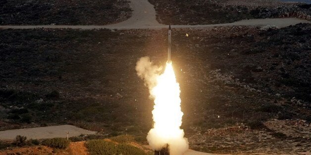 An S-300 PMU-1 anti-aircraft missile launches during a Greek army military exercise near Chania on the island of Crete on December 13, 2013. Greece is the first NATO country to try the Russian long-range missile system. AFP PHOTO / Costas Metaxakis (Photo credit should read Costas Metaxakis/AFP/Getty Images)